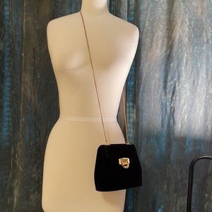 - Black velvet evening bag